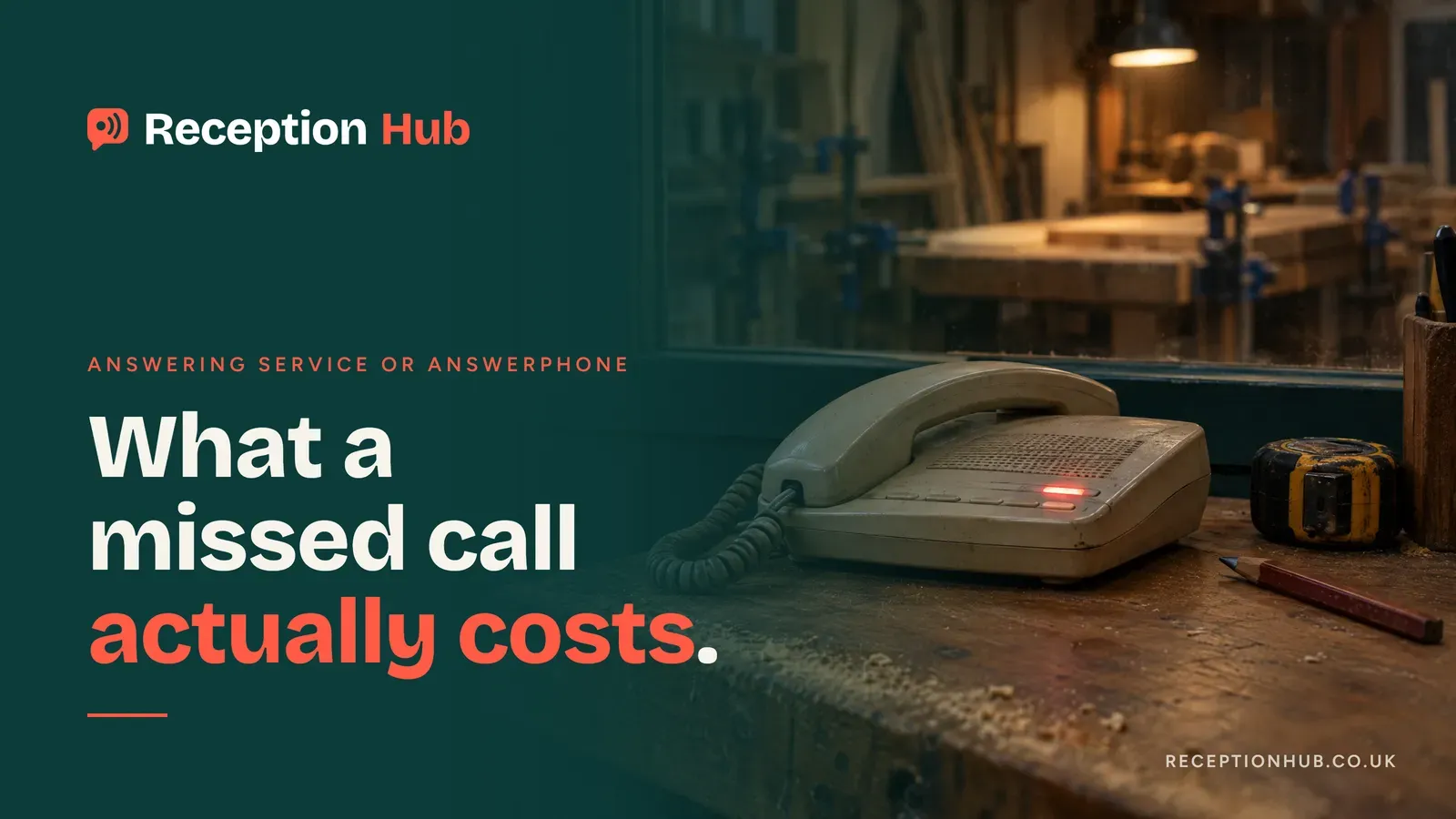 An old cream landline phone with a built-in answering machine on a sawdust-covered workbench, its red message light glowing, with a dim joinery workshop seen through the window behind
